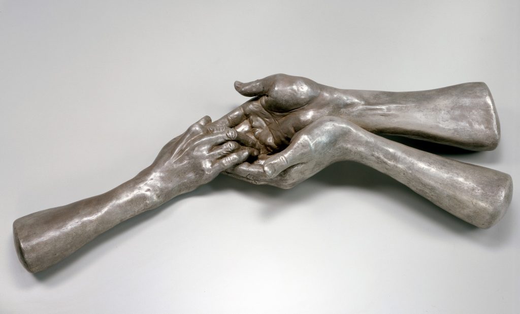el ele tutuşan ellerin heykeli